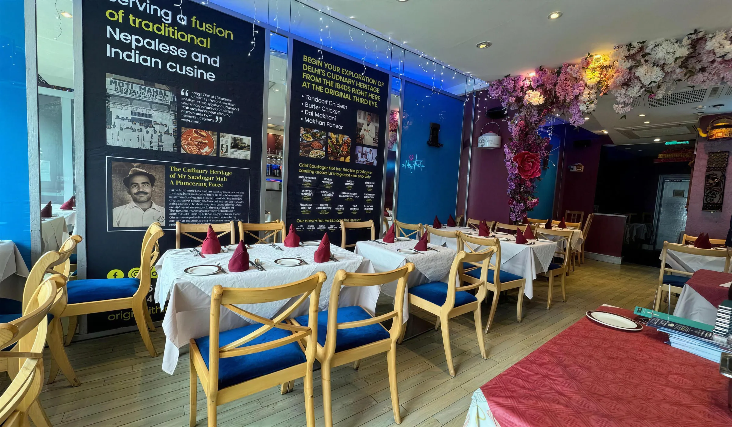 Tables by the blue wall